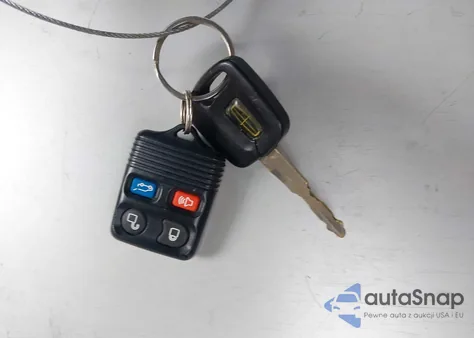 1999 Lincoln Town Car Cartier z USA, uszkodzony, nr VIN 1LNHM83W9XY612792